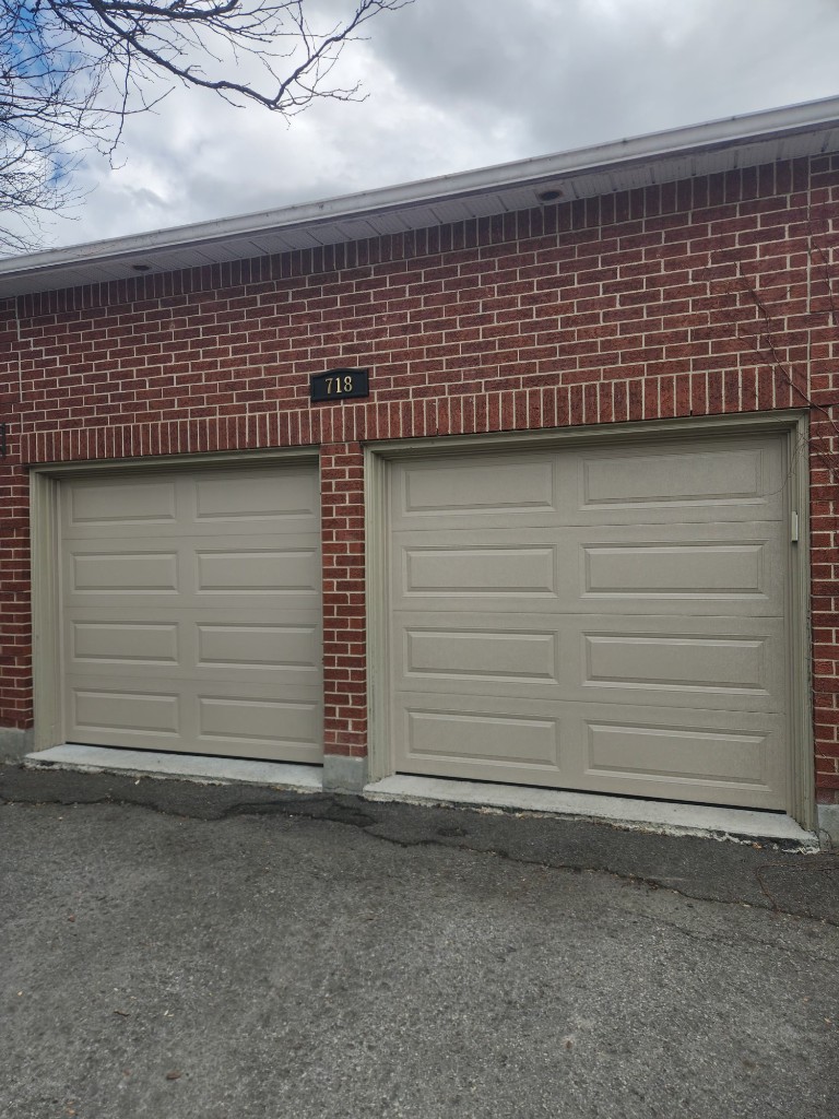 Two new beige garage doors installed in Orleans Ottawa