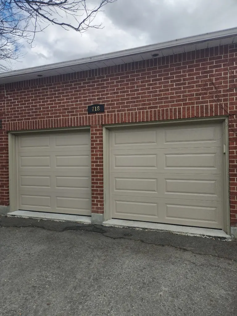 Two new beige garage doors installed in Orleans, Ottawa