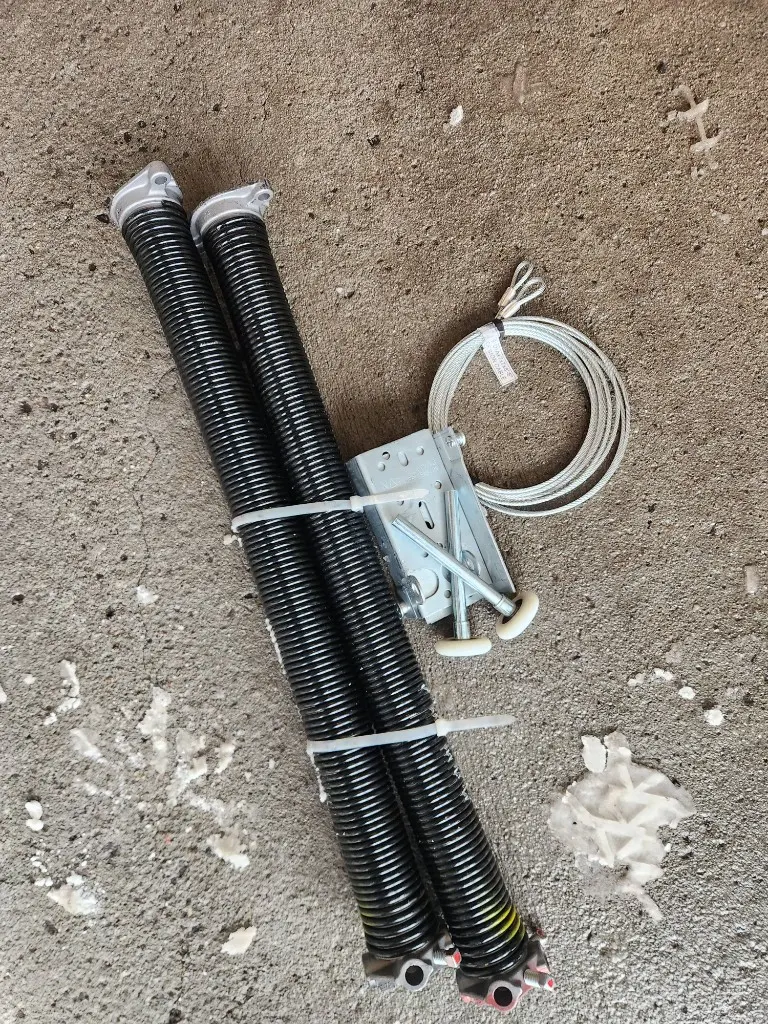 Garage door repair parts laid out for same-day service in Carp Ontario area