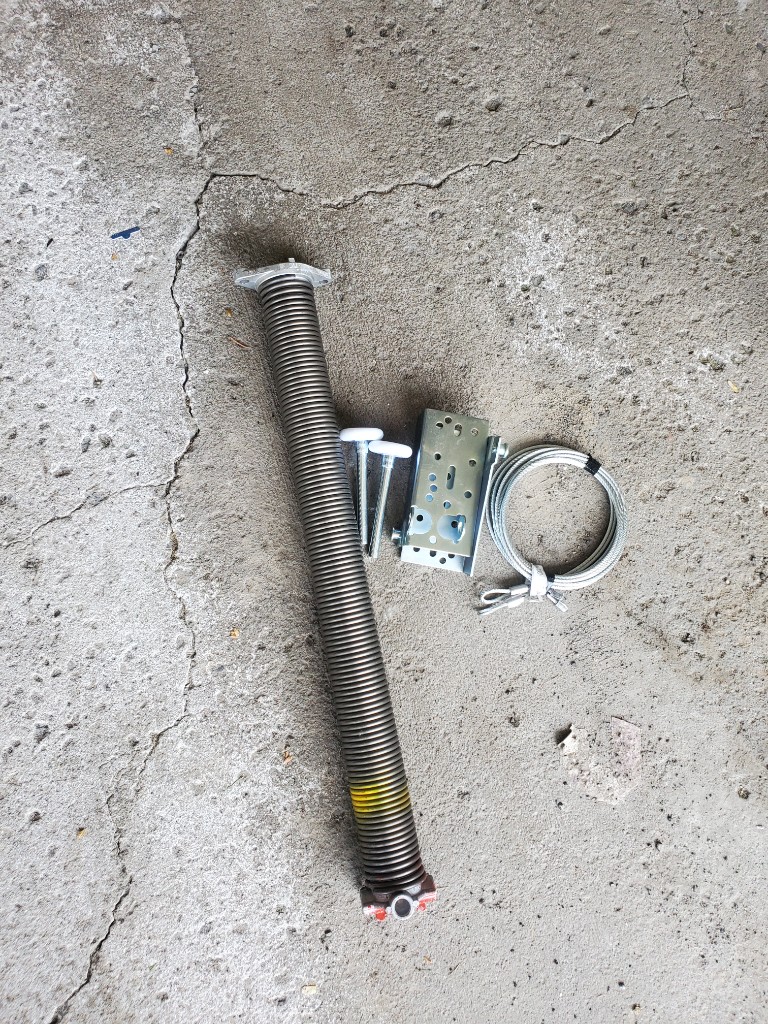 Garage door spring hardware and replacement parts in Barrhaven Ottawa