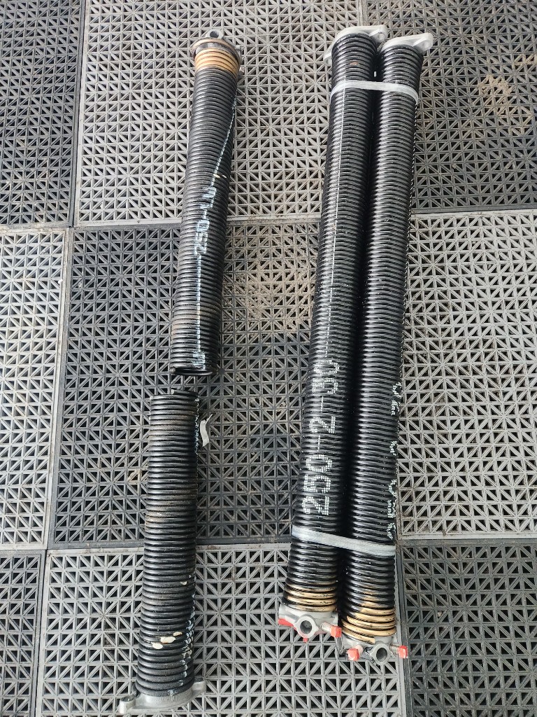 New torsion springs installed on a garage door in Barrhaven Ottawa