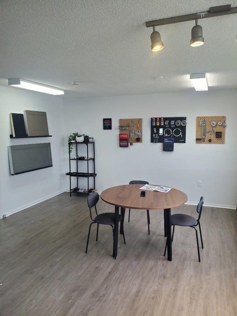 GDS Ottawa garage door showroom at 58 Larkspur Drive, Nepean — door samples, hardware, and consultation table
