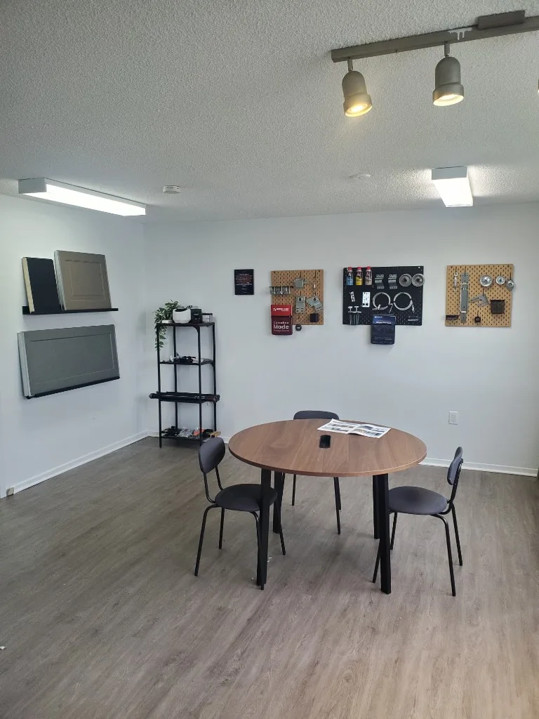 GDS Ottawa garage door showroom at 58 Larkspur Drive, Nepean — door samples, hardware, and consultation table