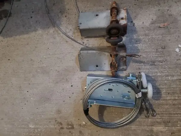 Garage door cable repair completed in Kanata showing new heavy-duty lift cables